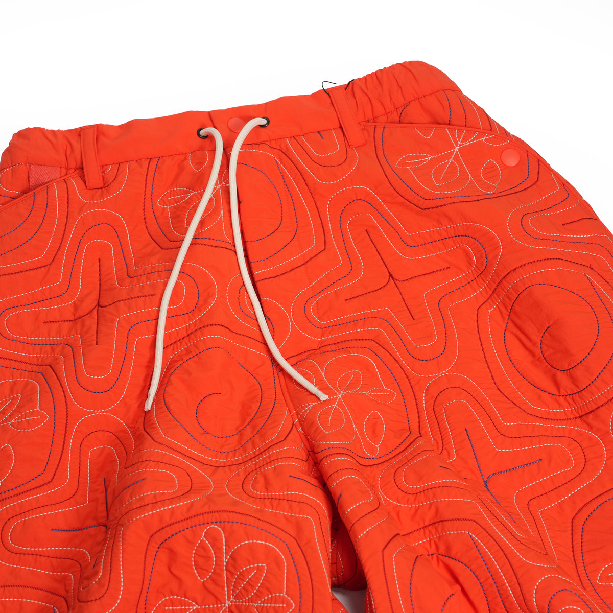 AINU Quilting Pants – Orange | NORBIT