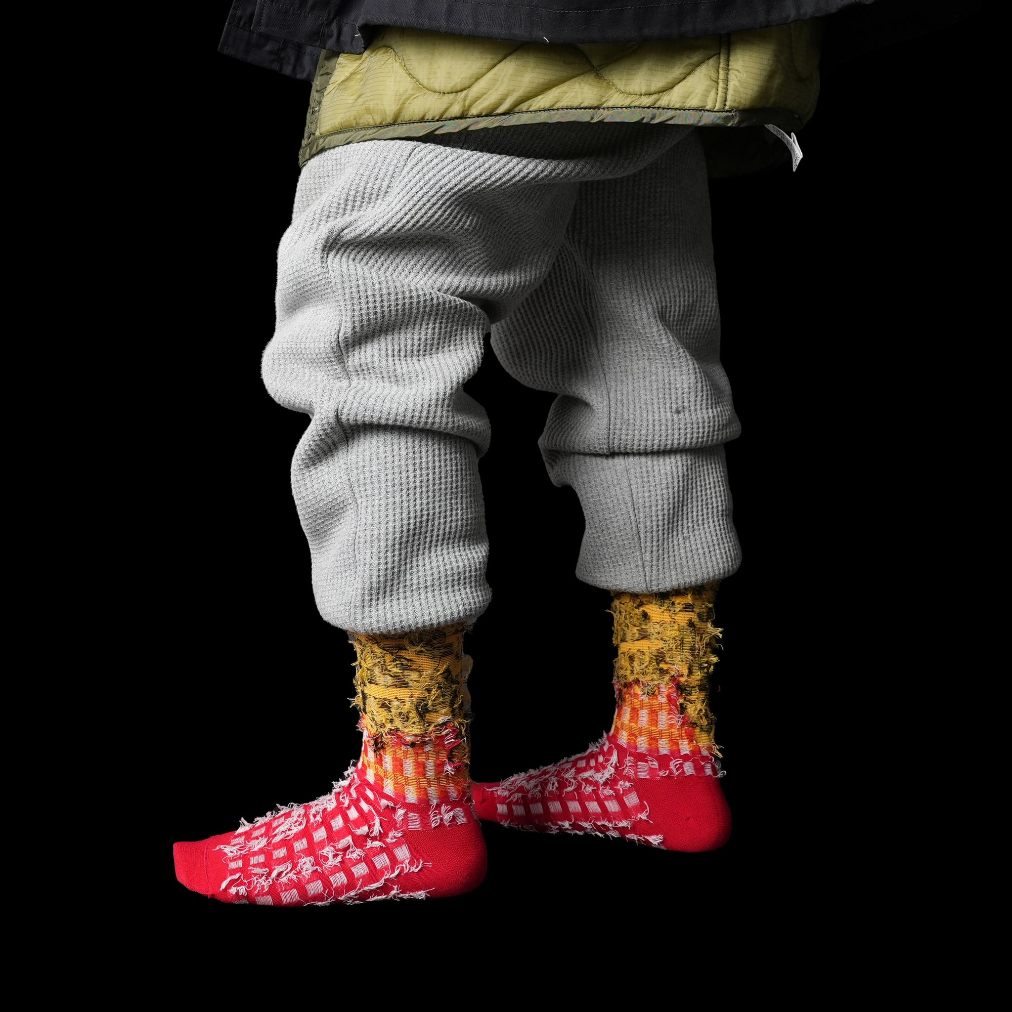 赤のヒョウ柄ソックス LEO MELT | BILLY BUDDUSKY × ADDICTION別注デザイン ネコポス対応 裏面着用画像