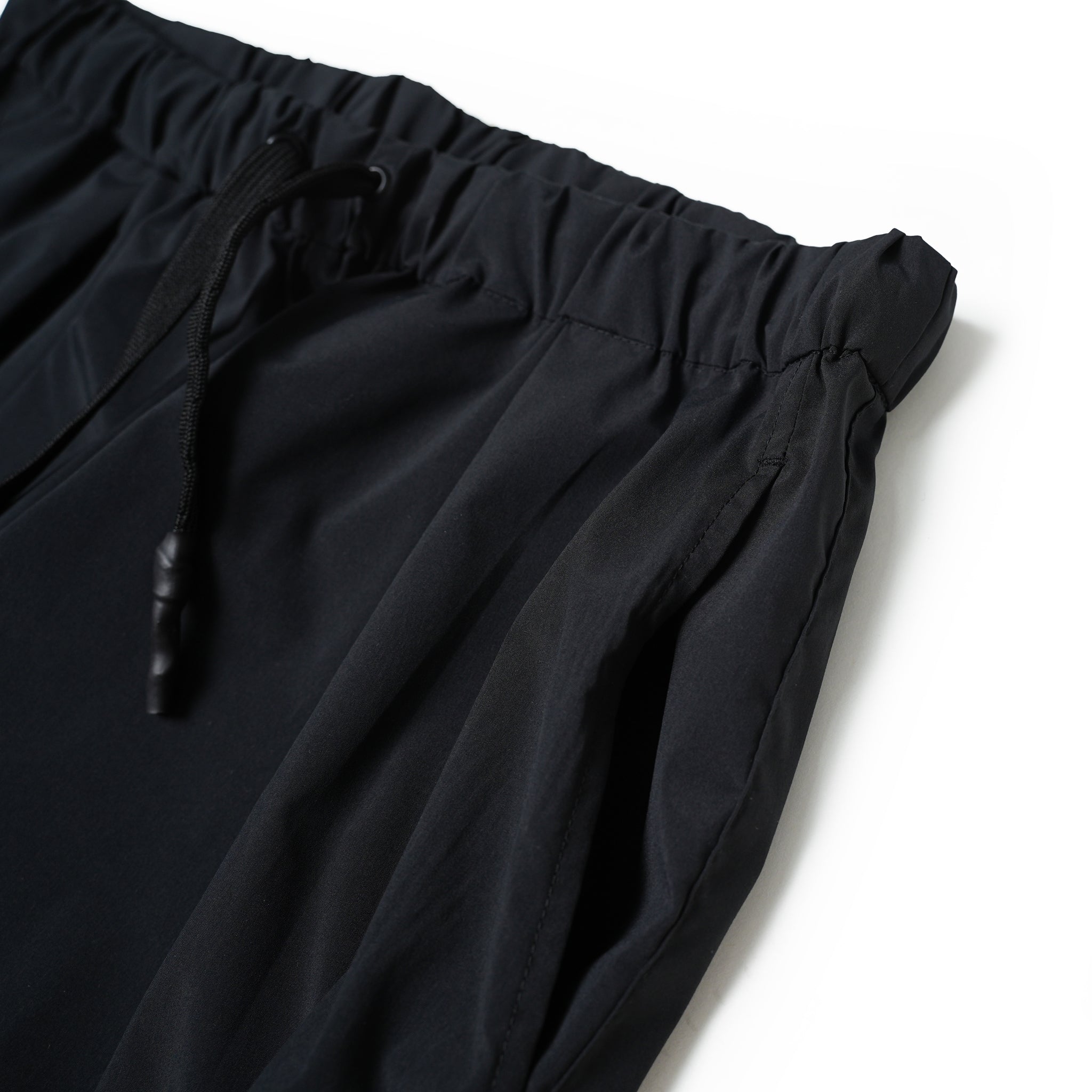 No:UN-014_AW23 | Name:WATER REPELLENT TAPERED STRETCH TRACK PANTS | Color:Black【UNTRACE_アントレース】