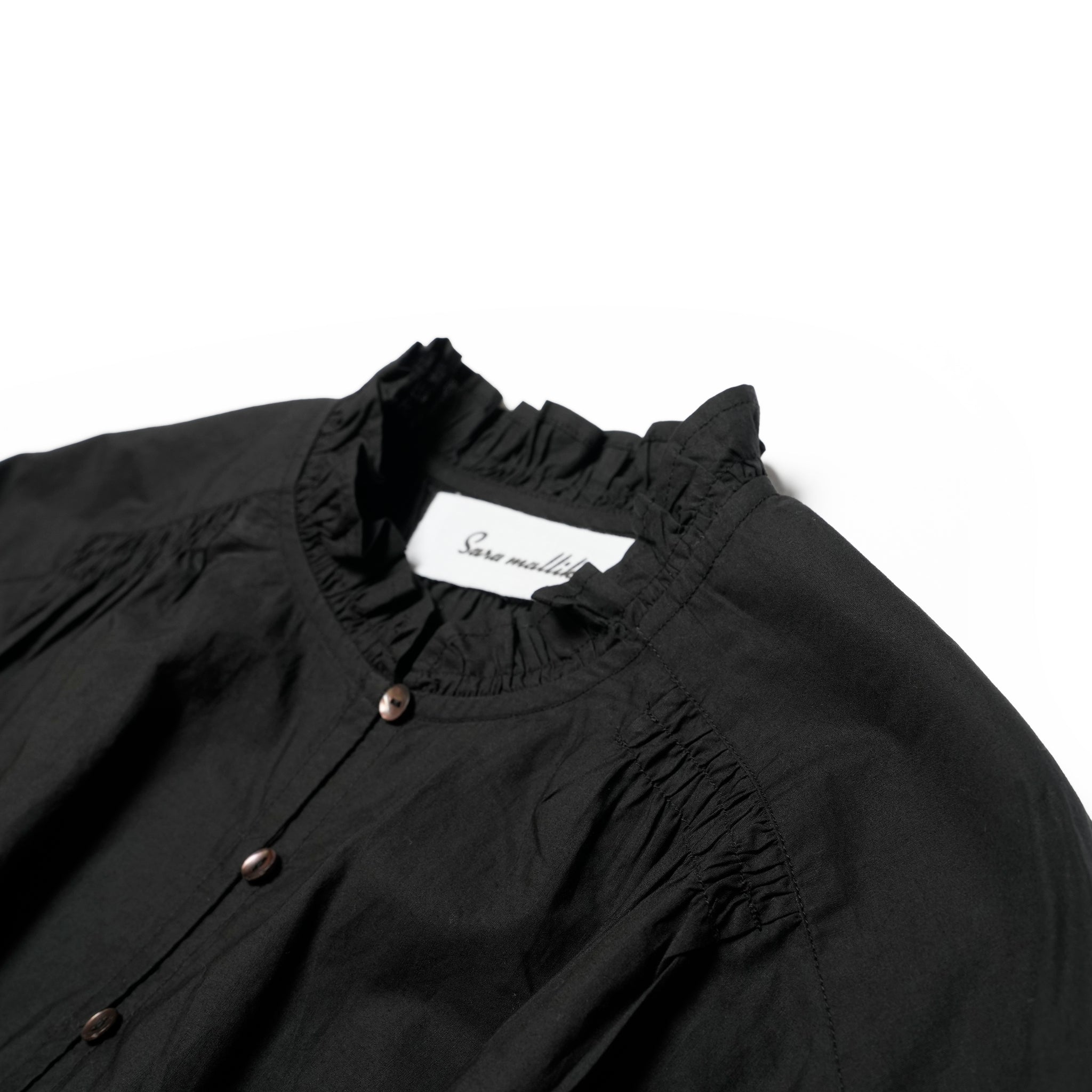 COTTON VOLUME FRILL SHORT BLOUSE – Black | SARAMALLIKA