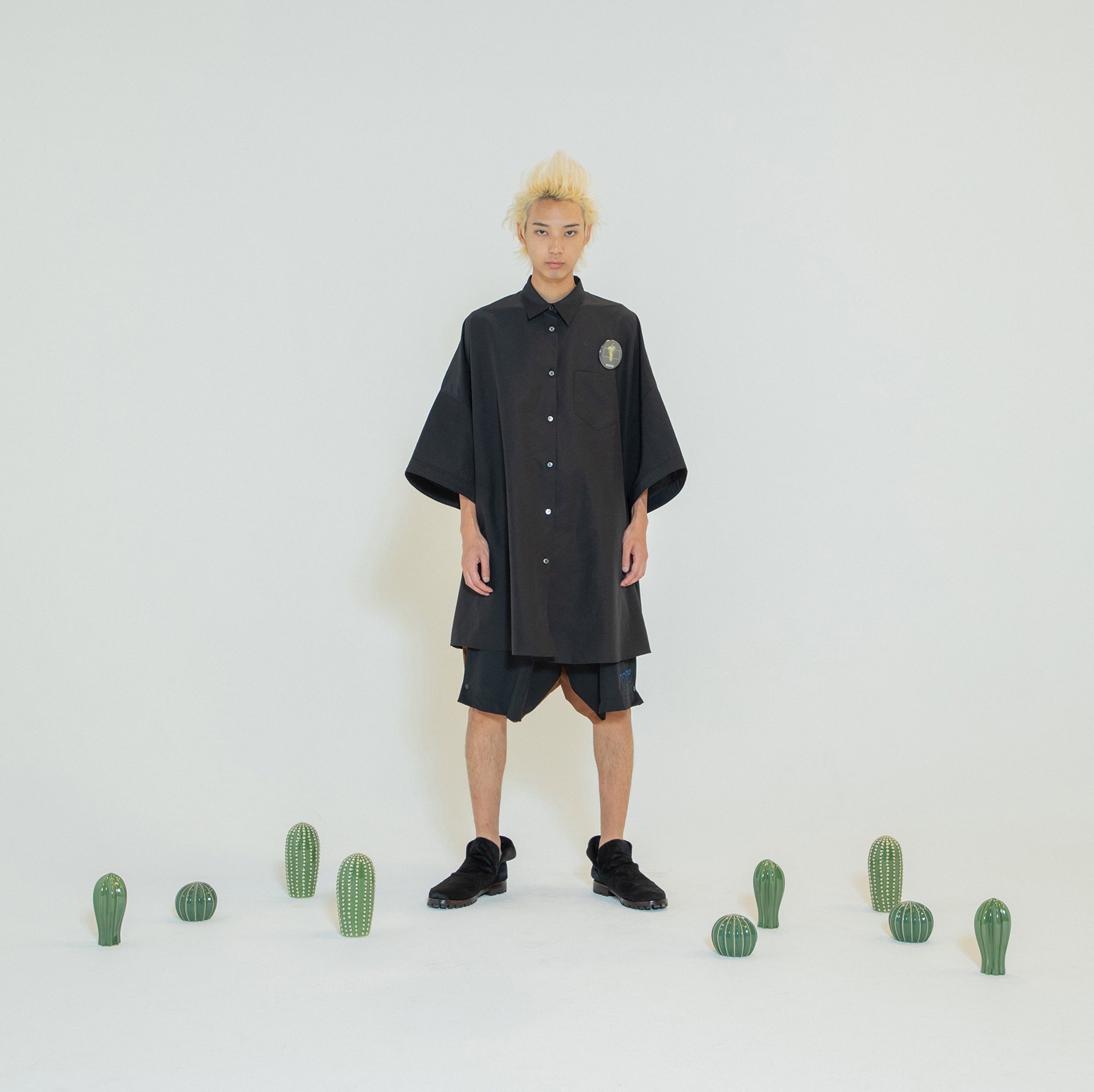 Packable Circle Poncho Shirt – Black | NEYVOR