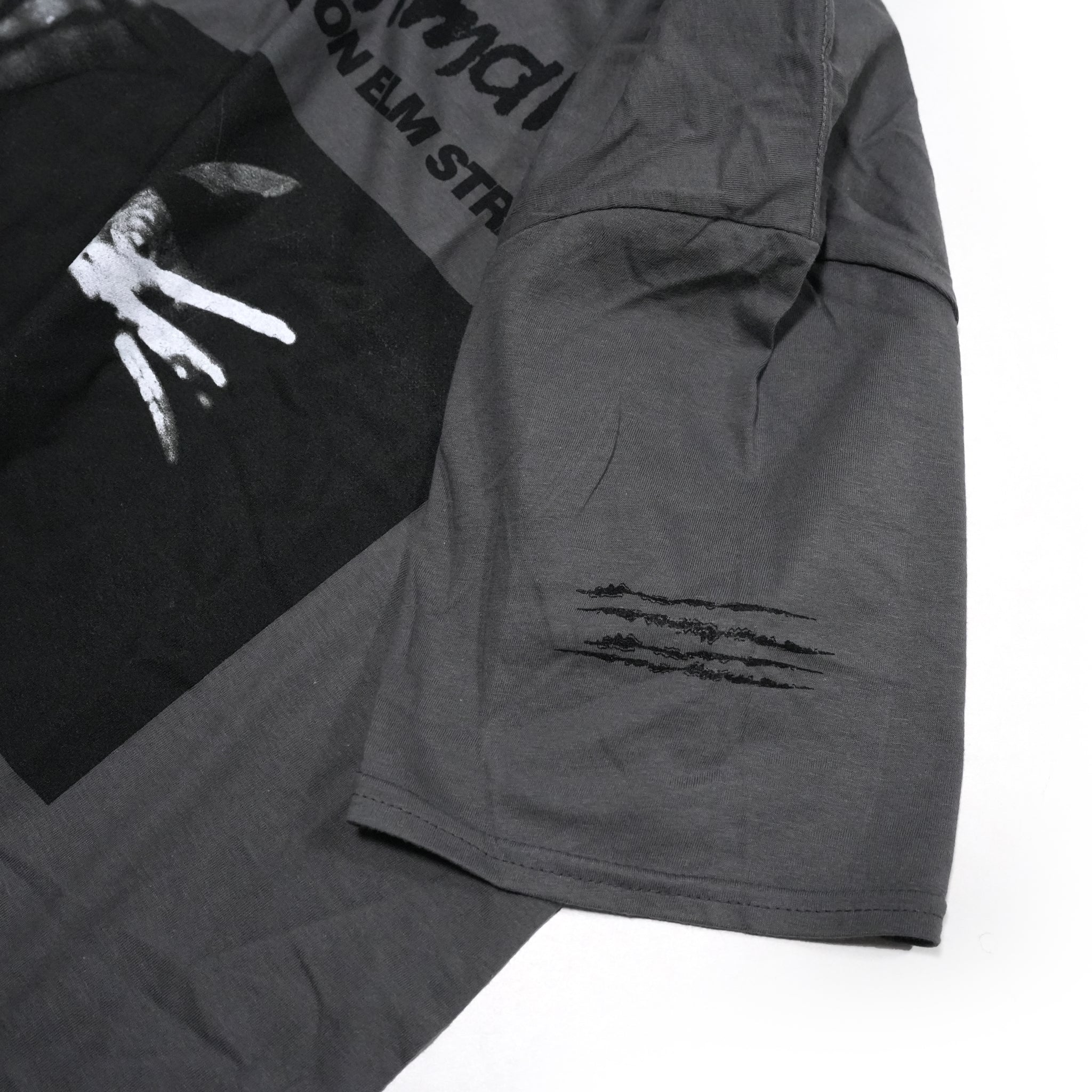 Name:WarnerBros_NIGHTMARE ON ELM STREET SLEEVE SCRATCH_Unisex_CHAR【ROCK OFF】【ネコポス選択可能】