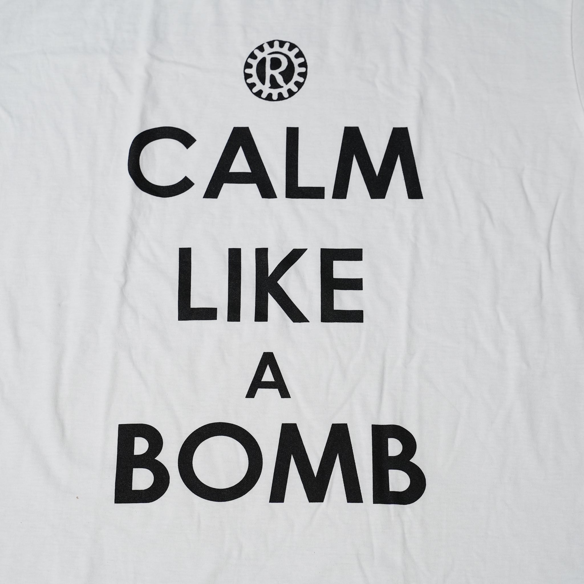 No:RATMTS08MW | Name:RATM_Calm Like A Bomb_Unisex_Tee_Rage Against The Machine | Color:White【ROCK OFF】【ネコポス選択可能】【archive】