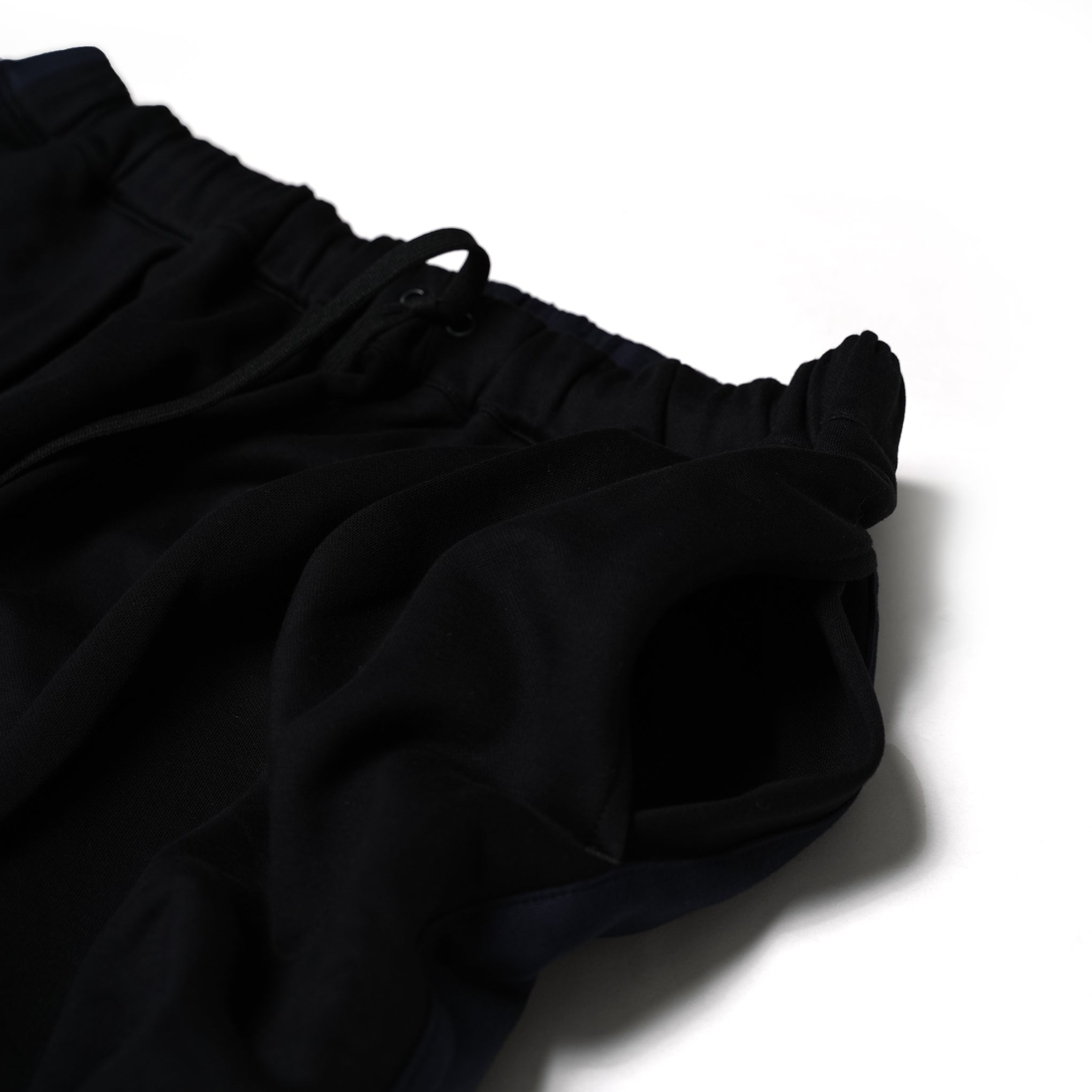 No:UN-017_SS23 | Name:TAPERED SWEAT TRACK PANTS BICOLOR | Color:Black × Navy【UNTRACE_アントレース】【archive】