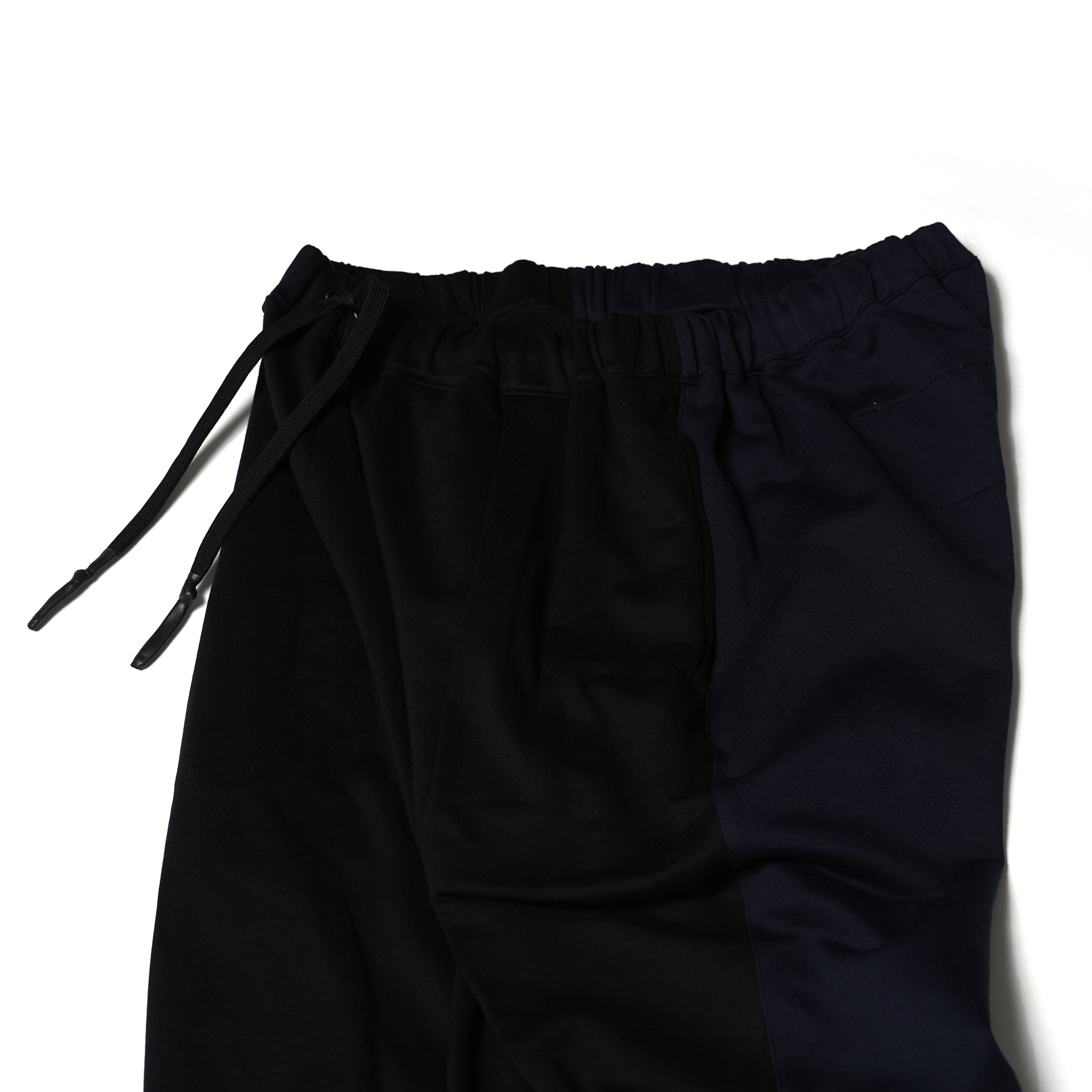 No:UN-017_SS23 | Name:TAPERED SWEAT TRACK PANTS BICOLOR | Color:Black × Navy【UNTRACE_アントレース】【archive】